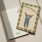 Birthday greeting card featuring a cute mouse with raised arms holding a “Su gimimo diena” sign, whimsical and cheerful birthday card design.