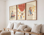 Storybook mouse wall art set featuring a mouse on a scooter, a mouse sitting on books, and a mouse in a hot air balloon with starry details