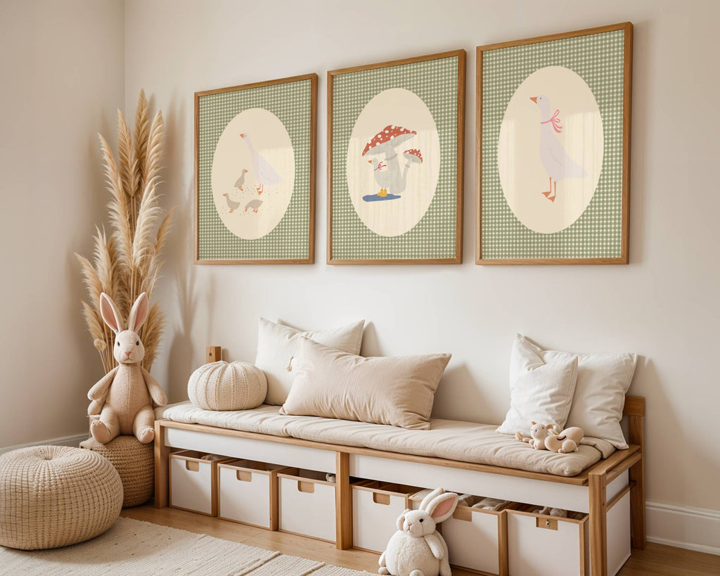 Set of three matching children’s posters featuring cute duck illustrations in oval frames on a green gingham background, in a soft classic style