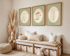 Set of three matching children’s posters featuring cute duck illustrations in oval frames on a green gingham background, in a soft classic style