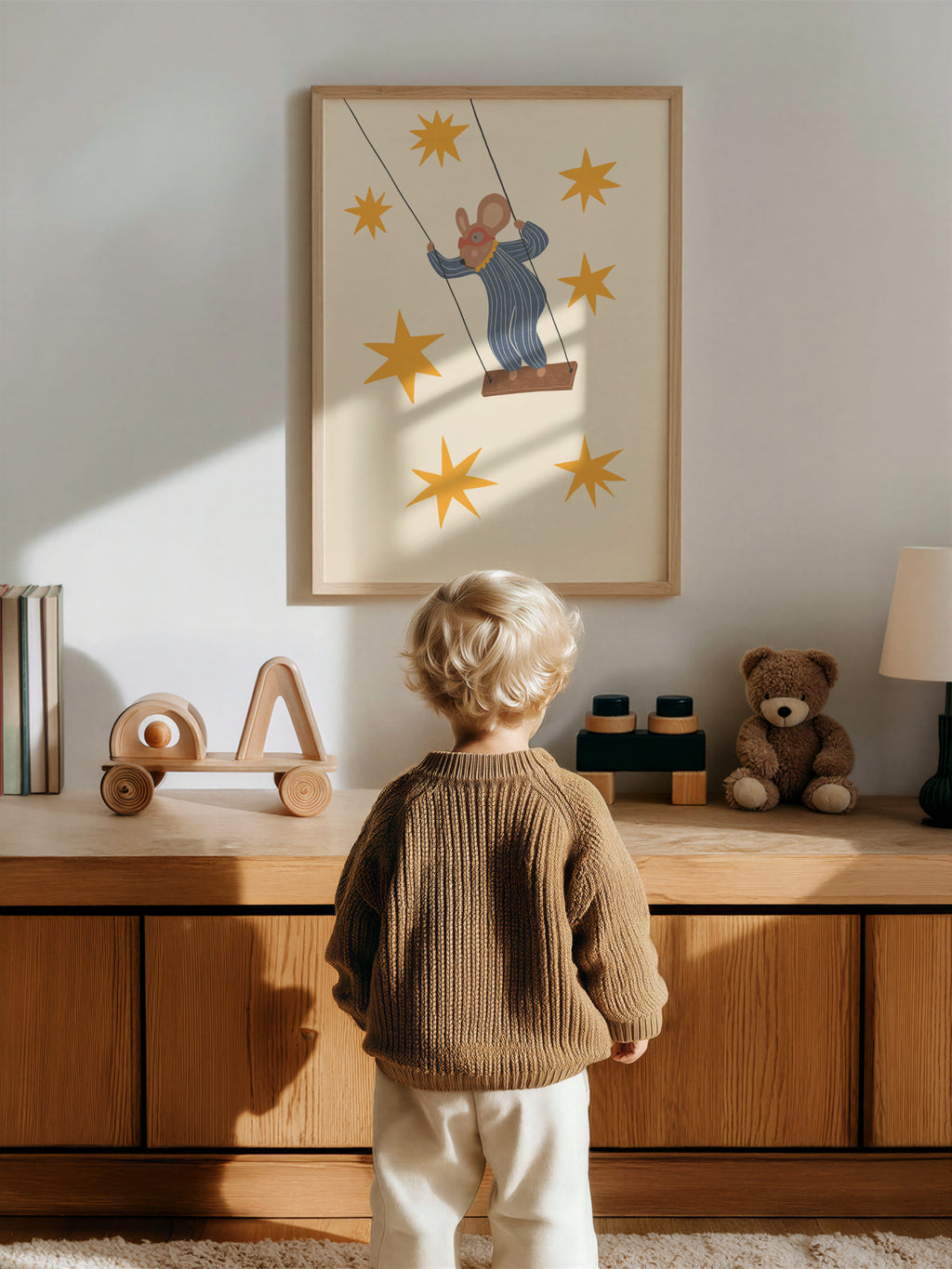 Whimsical mouse nursery wall art set featuring a mouse on a swing and a superhero mouse on a tire swing in soft neutral tones