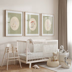 Set of three matching children’s posters featuring cute duck illustrations in oval frames on a green gingham background, in a soft classic style