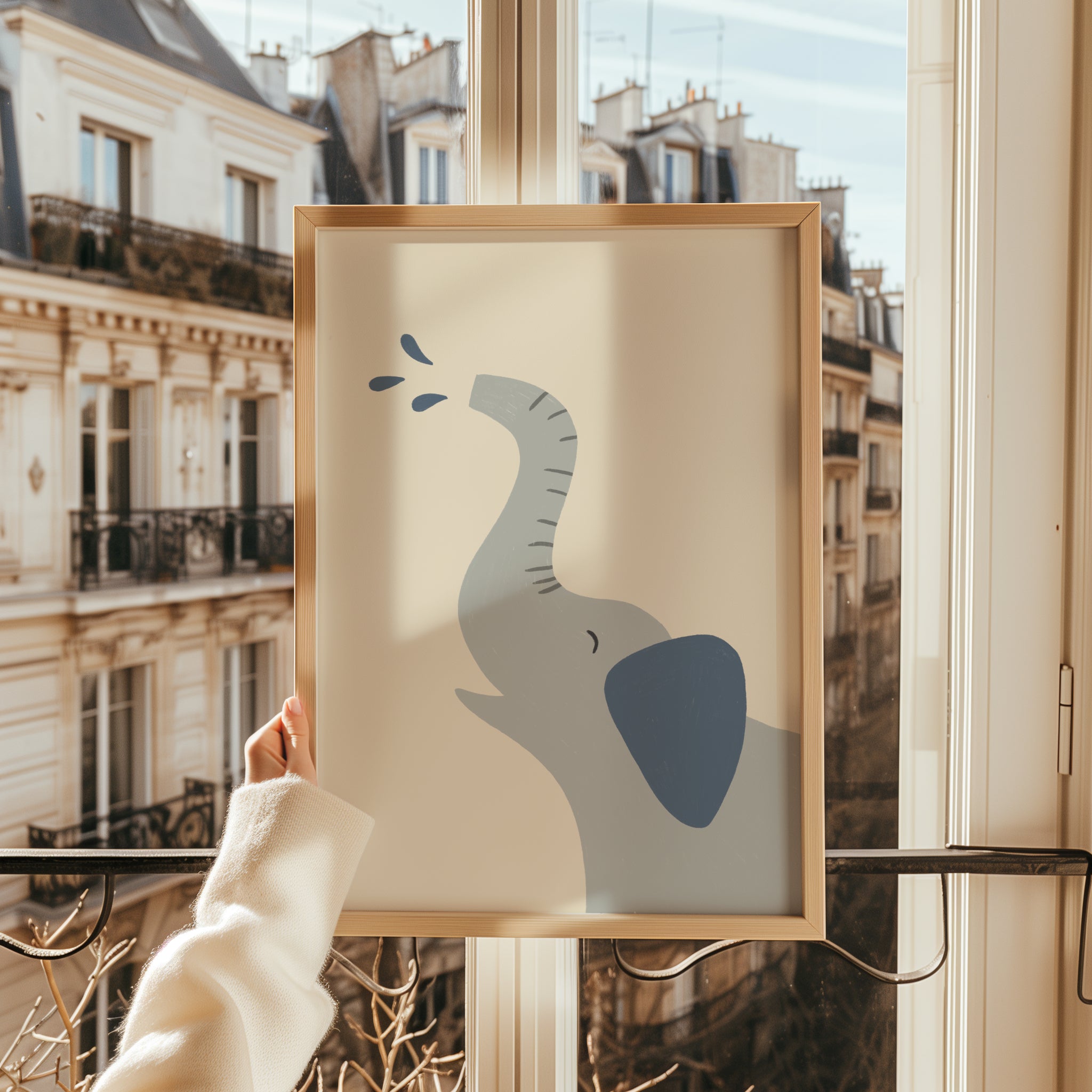 Minimalist safari-style nursery wall art featuring a Scandinavian elephant illustration spraying water, drawn on a soft beige background in a clean modern style, printable digital artwork for safari-themed kids room, nursery, or playroom decor, designed to create a calm, playful, and contemporary interior atmosphere.