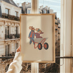 Whimsical nursery wall art featuring two mice wearing aviator goggles, one pushing a wheelbarrow while the other rides inside with arms outstretched, on a soft beige background.